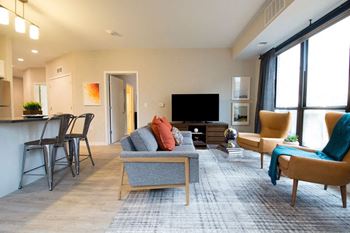 Living room at confluence on 3rd apartments in des moines in downtown des moines