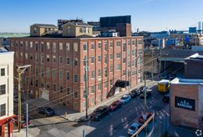 Philadelphia apartment for rent - an aerial view of a large brick building in a city