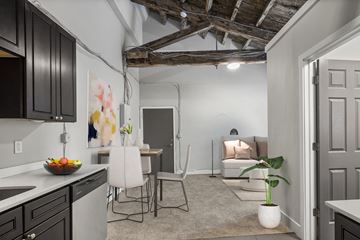 Philadelphia apartment for rent - A kitchen with a table and chairs in the middle of the room.