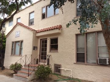 Los Angeles apartment for rent - A house with a staircase leading to the front door.