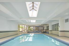 Toronto apartment for rent - the indoor pool is under a skylight in the pool room of a house