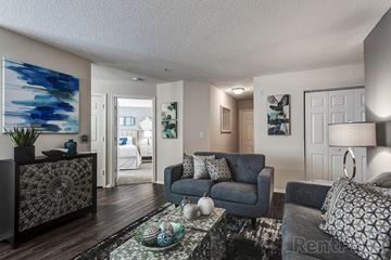 Denver apartment for rent - a living room with a couch and a coffee table