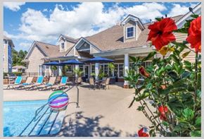 Denver apartment for rent - a house with a swimming pool and a deck with lounge chairs