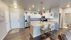 Fargo apartment for rent - kitchen, grand apartments, fargo apartments, copper light fixtures, white cabinets