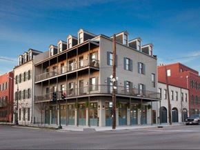 New Orleans apartment for rent - Exterior view of Aloysius Apartments showcasing the building façade and surrounding neighborhood