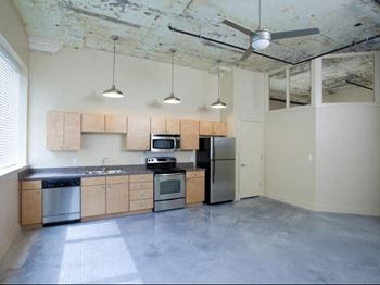 Concrete flooring throughout apartment