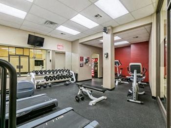 Fitness center including cardio and strength training equipment