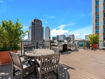 Rooftop barbecue grilling stations featuring outdoor dining