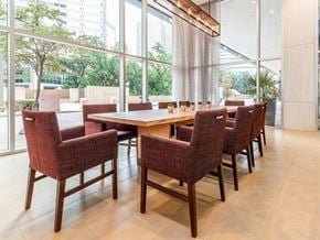 Dallas apartment for rent - a large dining room with a table and chairs