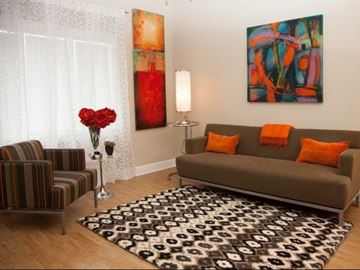 New Orleans apartment for rent - a living room with a couch and a chair