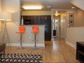New Orleans apartment for rent - a living room with a bar and a kitchen