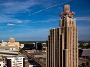 Jackson apartment for rent - a skyscraper with a sign on the top of a building