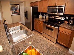 Jackson apartment for rent - a kitchen with stainless steel appliances and a bowl of fruit
