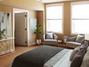 Jackson apartment for rent - a bedroom with a couch and chairs and a bed