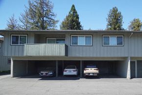 Sunnyvale apartment for rent - a parking garage with three cars in front of a house