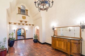 Palo Alto apartment for rent - the lobby of a hotel with a reception desk and a chandelier