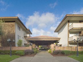 Mountain View apartment for rent - a walkway between two buildings with an awning