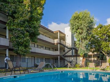 Mountain View apartment for rent - a swimming pool in front of a hotel with a pool