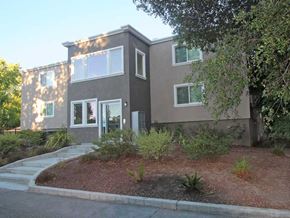 Menlo Park apartment for rent - a house with a landscaped yard in front of it