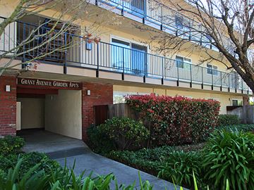Palo Alto apartment for rent - an apartment building with a sign that reads grant avenue garden flats