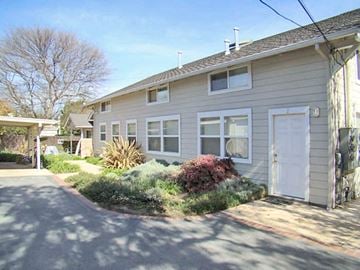Palo Alto apartment for rent - a white house with a white door and a driveway