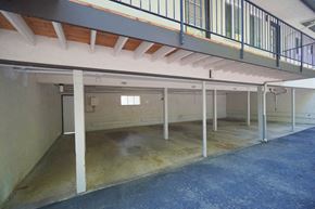 Palo Alto apartment for rent - the inside of a building with a garage and a staircase