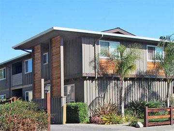 Palo Alto apartment for rent - a house with a palm tree in front of it