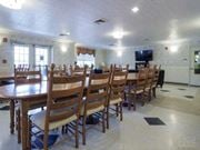 Perryville apartment for rent - a large dining room with a long table and chairs