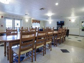 Perryville apartment for rent - a large dining room with a long table and chairs
