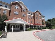 Perryville apartment for rent - the front of a brick building with a wheelchair ramp