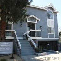 Los Angeles apartment for rent - a blue house with stairs and a tree in front of it
