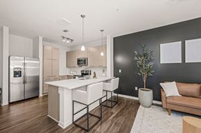 Charlotte apartment for rent - a kitchen with an island and a refrigerator