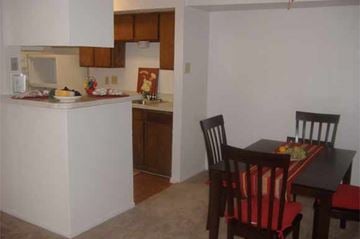 Richland Hills apartment for rent - A kitchen with a table and chairs.