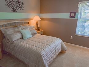 Fishers apartment for rent - a bedroom with a bed and a window
