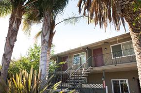 Santa Clara apartment for rent - a house with a staircase and palm trees