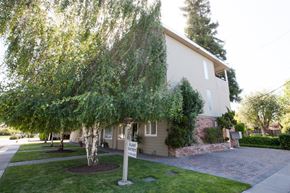 San Jose apartment for rent - the front of a house with a yard and trees