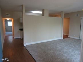 San Jose apartment for rent - an empty living room with white walls and a carpet