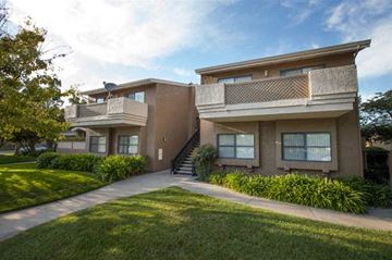Mountain View apartment for rent - an apartment building with a sidewalk in front of it