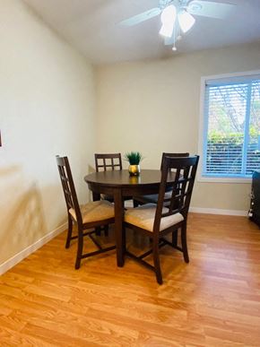 Mountain View apartment for rent - a dining room with a table and chairs