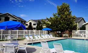 Taylorsville apartment for rent - Swimming Pool With Relaxing Area at Bridgeside Landing Apartments, Taylorsville, UT