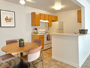 Taylorsville apartment for rent - Well Equipped Eat-In Kitchen at Bridgeside Landing Apartments, Utah, 84123