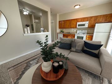 Salt Lake City apartment for rent - a living room with a couch and a coffee table
