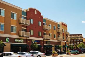Ogden townhouse for rent - a building with cars parked in front of it