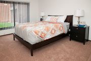 New Hope apartment for rent - a bedroom with a large bed and a window