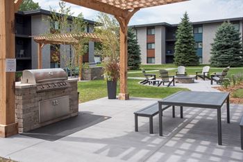 Patio with a grill 