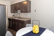 West Saint Paul apartment for rent - a kitchen and dining room with a bowl of lemons on the table