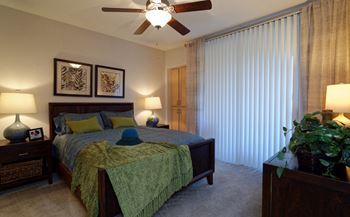 The legends at la paloma apartments model bedroom with ceiling fan