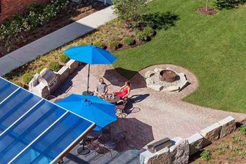 Outdoor grill with intimate seating area