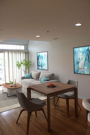 Garwood apartment for rent - a living room with a couch and a dining table