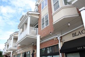 Garwood apartment for rent - the outside of a building with a balcony and a black bar
